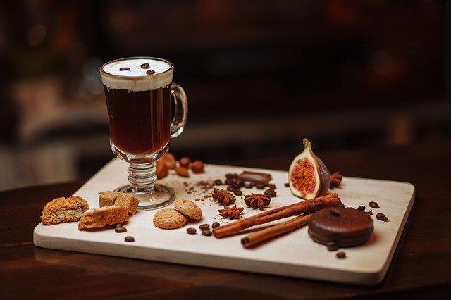 Irish-coffee-on-wooden-board-with-fruit-and-biscuits