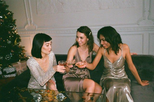 Three-women-toasting-drinks-at-New-Year