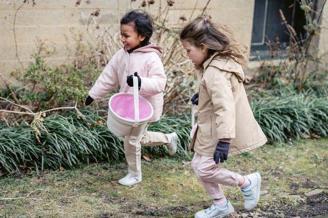 Two-children-with-Easter-baskets-for-an-Easter-egg-hunt