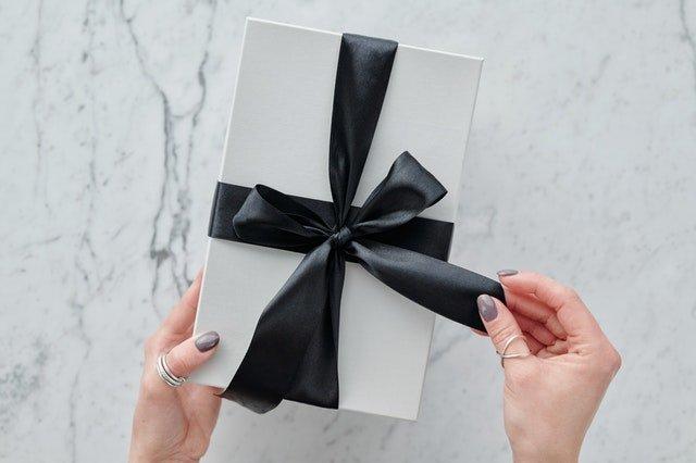 White-gift-box-with-black-ribbon