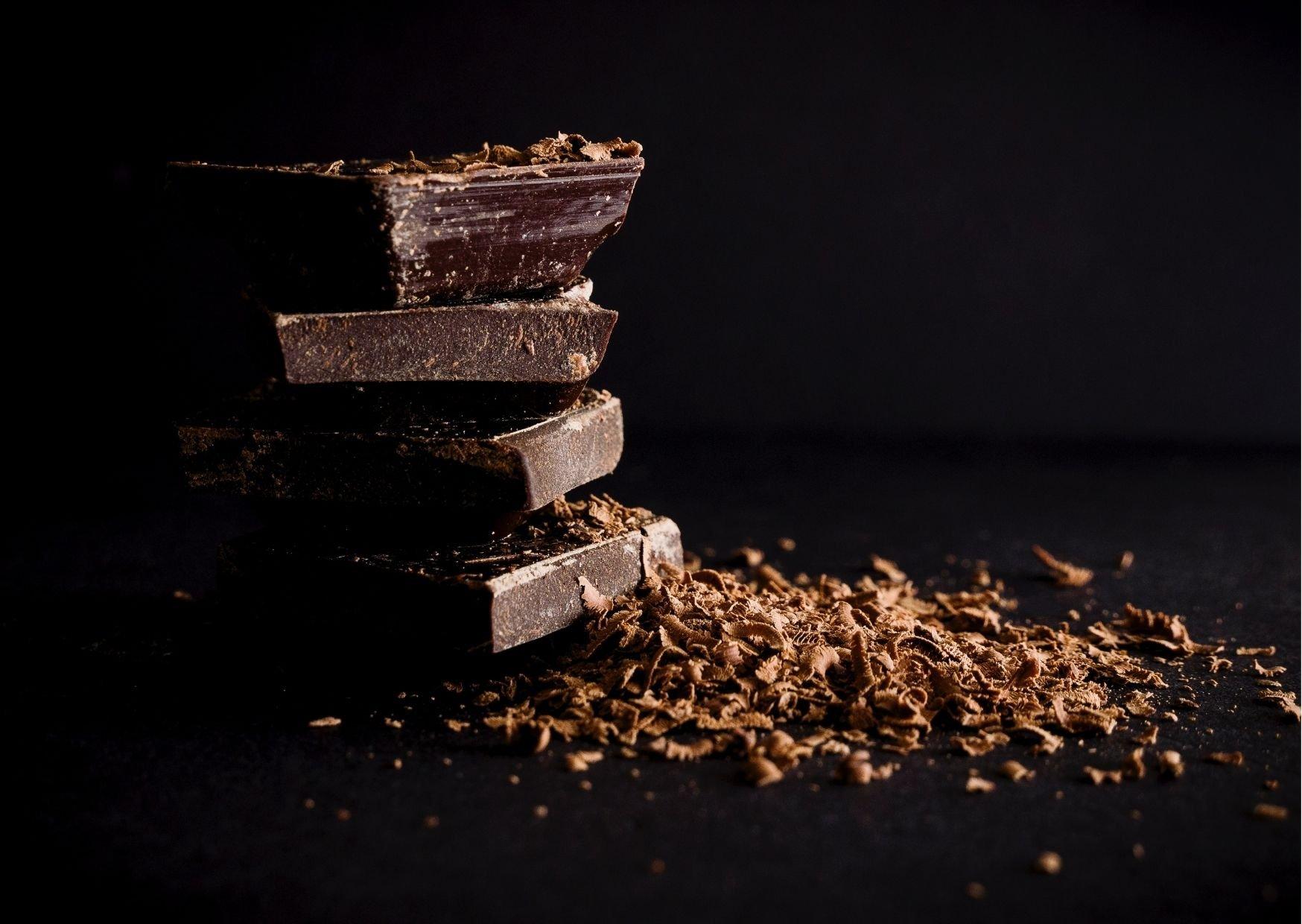 dark-chocolate-squares-on-black-background