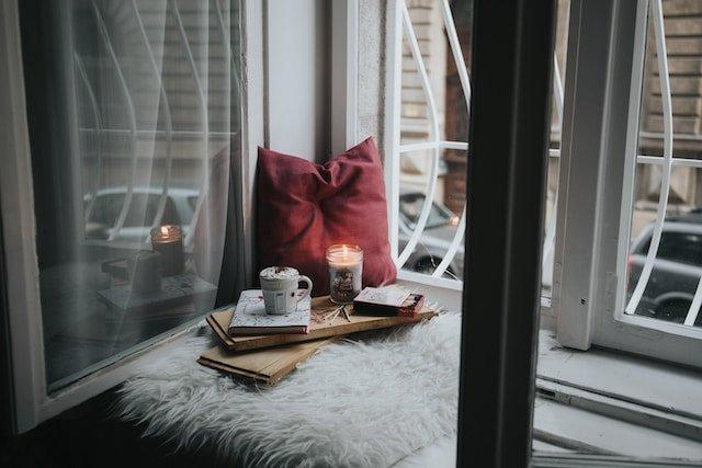 hot-chocolate-and-candle-by-window