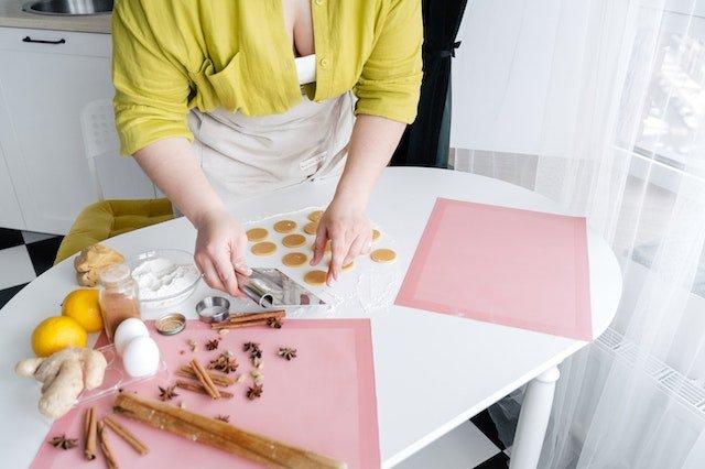 woman-baking-gingerbread-biscuits